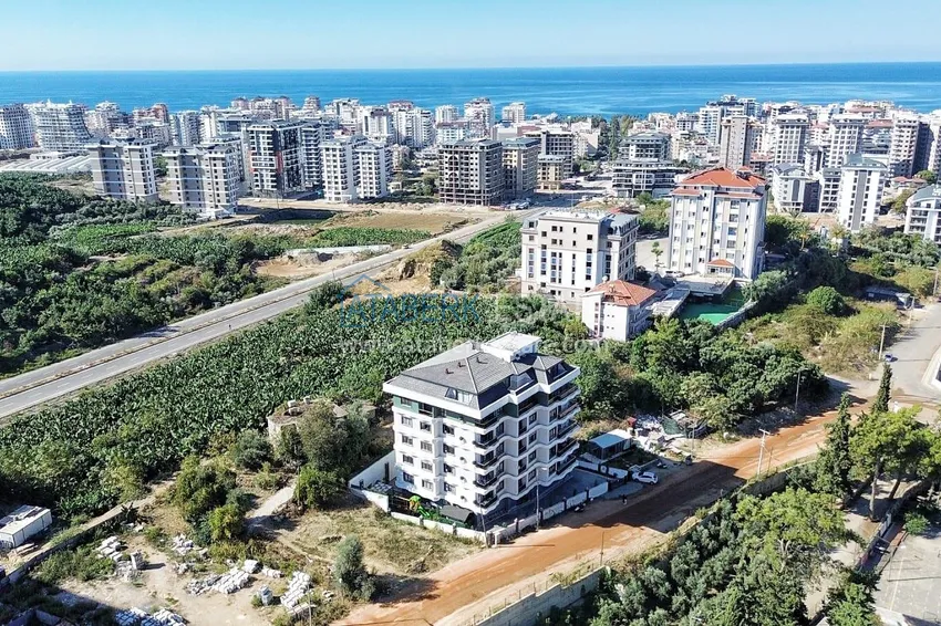 New 1+1 apartments with mountain views in Mahmutlar — primary real estate in Alanya 1
