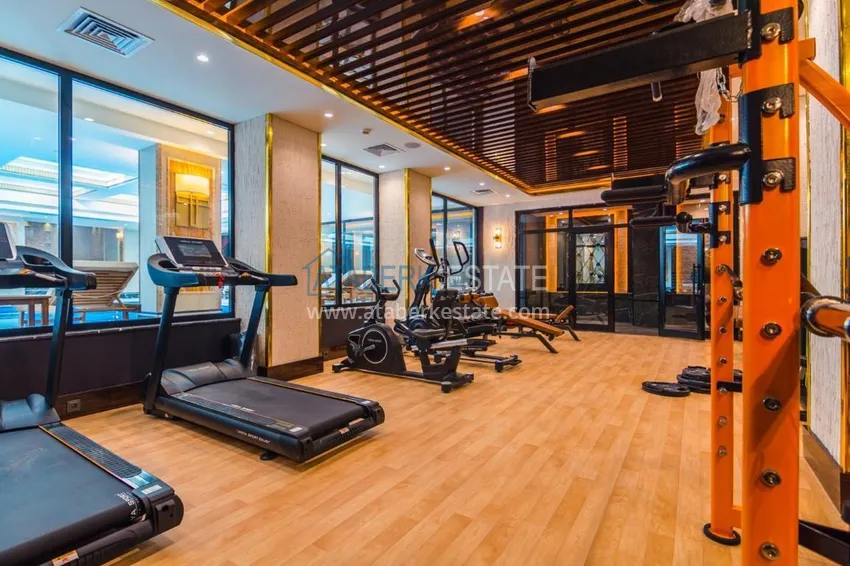 Luxury real estate on the first line in Alanya: stylish apartment, VIP-level complex, Oba district 24
