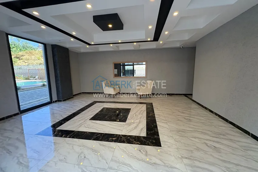 Nowy apartament 1+1 w Mahmutlar, Alanya - nowy budynek z widokiem na góry 12