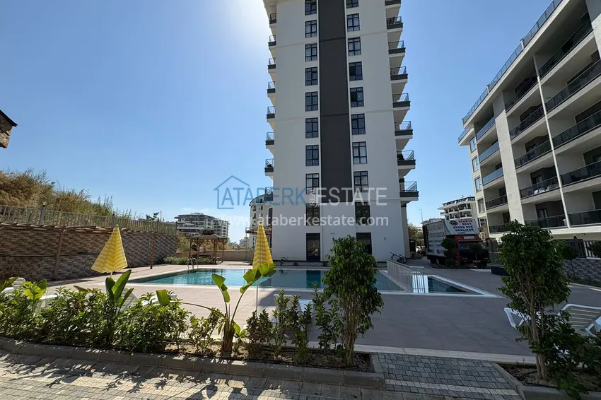 Nowy apartament 1+1 w Mahmutlar, Alanya - nowy budynek z widokiem na góry 1