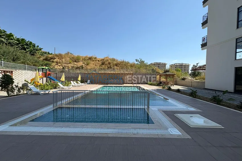 Nowy apartament 1+1 w Mahmutlar, Alanya - nowy budynek z widokiem na góry 3