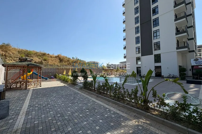 Nowy apartament 1+1 w Mahmutlar, Alanya - nowy budynek z widokiem na góry 5