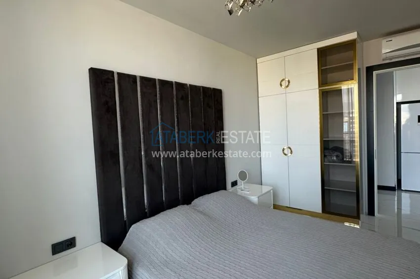 Purchase 2+1 apartment with panoramic view and partially furnished — Alanya, Mahmutlar 17