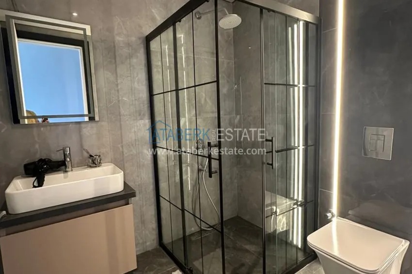 Purchase 2+1 apartment with panoramic view and partially furnished — Alanya, Mahmutlar 19