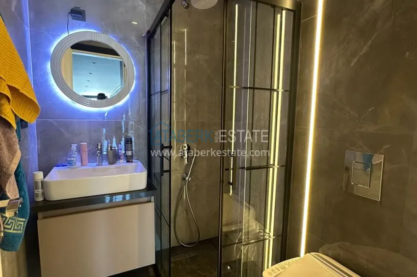 Purchase 2+1 apartment with panoramic view and partially furnished — Alanya, Mahmutlar 20