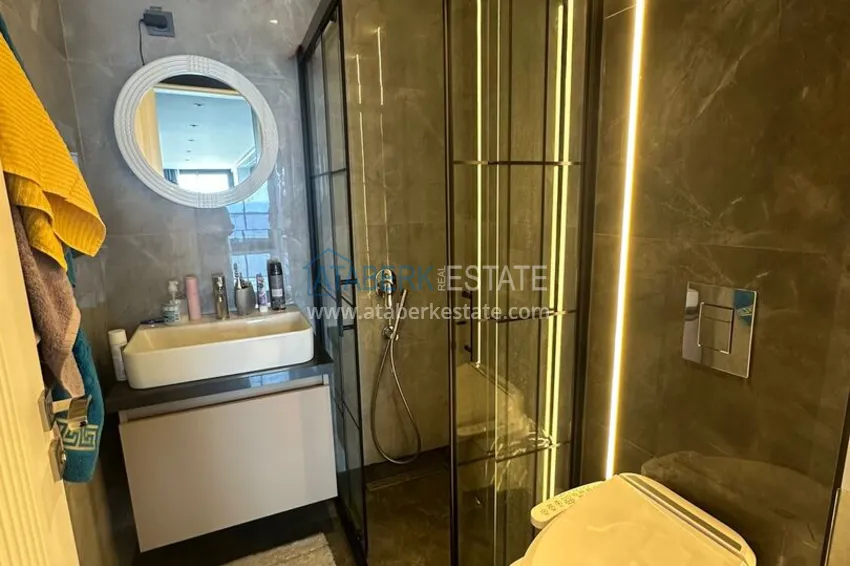 Purchase 2+1 apartment with panoramic view and partially furnished — Alanya, Mahmutlar 21