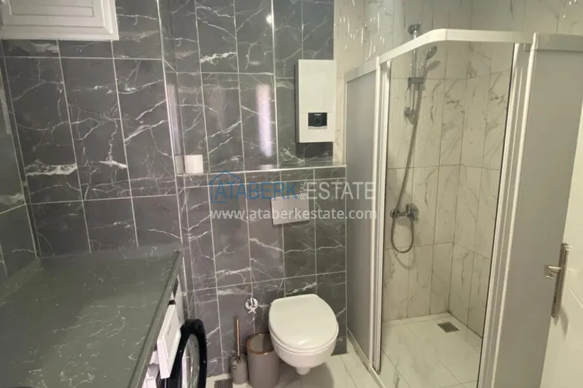 Purchase 1+1 furnished apartment in Alanya, Avsallar district with short-term rental permit 11