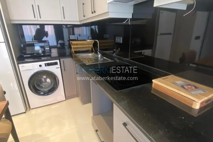 Purchase 1+1 apartments for rent in Mahmutlar — only 600 m from the sea, fully furnished No. 39 4