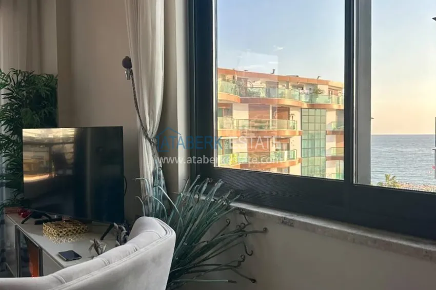 Purchase 2+1 apartment in Alanya, Oba with sea view — first line, citizenship 9