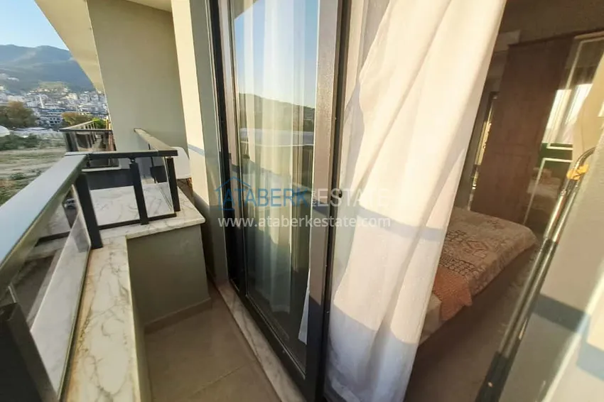 Purchase 1+1 apartment in Alanya, Oba district with furniture and mountain views — installments up to 6 months 11