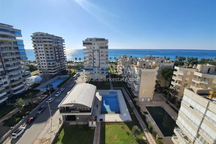 Apartment 2+1 on the beachfront in the center of Mahmutlar, Alanya — real estate for citizenship 1 