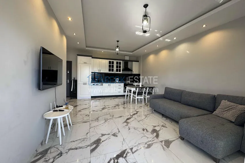 Purchase 1+1 furnished apartment in Alanya, Kestel - 150 m to the sea, glazed balcony 6
