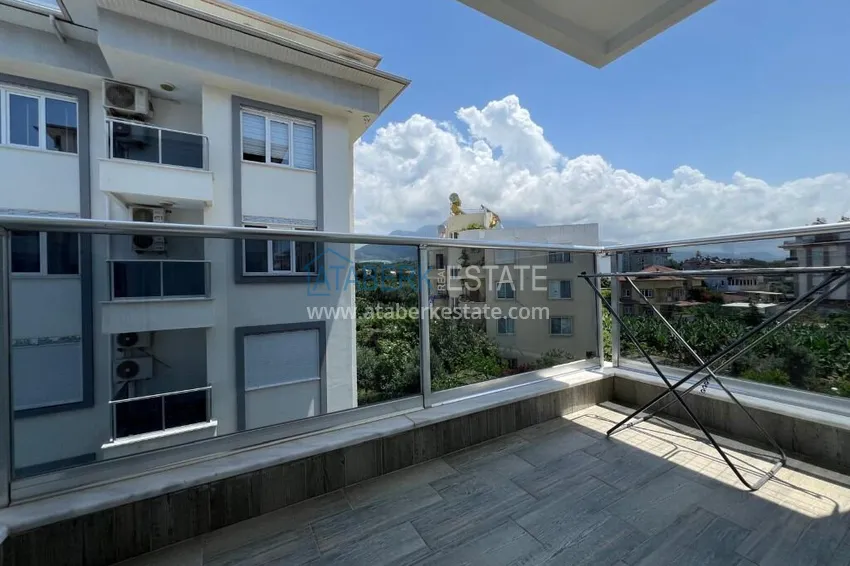 Purchase 2+1 apartment in Kestel by the sea - furnished option with mountain views 15
