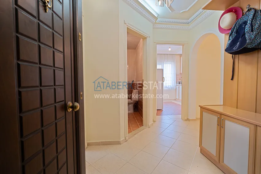Purchase 2+1 apartment in Tosmur with a separate kitchen 200 m from the sea — property for a residence permit in Alanya 1