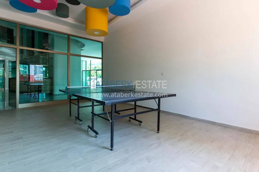 Turnkey 1+1 75 m² apartment with sea view in Mahmutlar 24