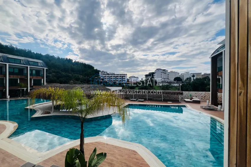 Purchase 2+1 duplex apartment in Konakli - with a pool terrace in an elite residence 7 
