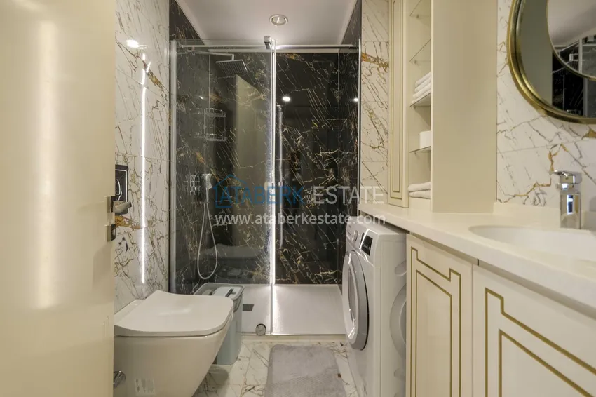 Kupuj Apartament 1+1 przy plaży w Mahmutlar — umeblowany i z panoramicznym widokiem na morze 10 