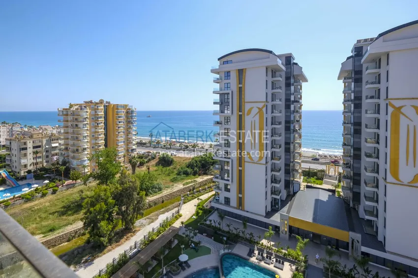 Kupuj Apartament 1+1 przy plaży w Mahmutlar — umeblowany i z panoramicznym widokiem na morze 14 