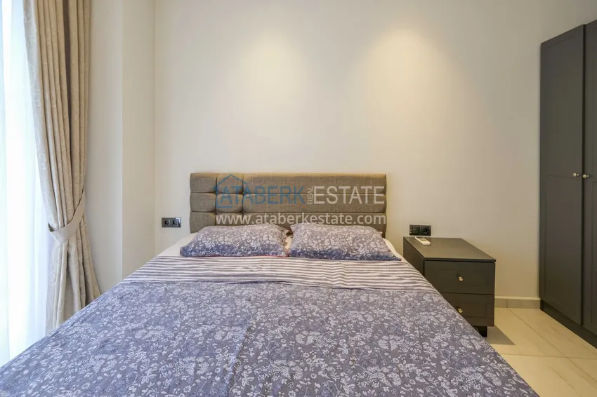Kupuj Apartament 1+1 przy plaży w Mahmutlar — umeblowany i z panoramicznym widokiem na morze 7 
