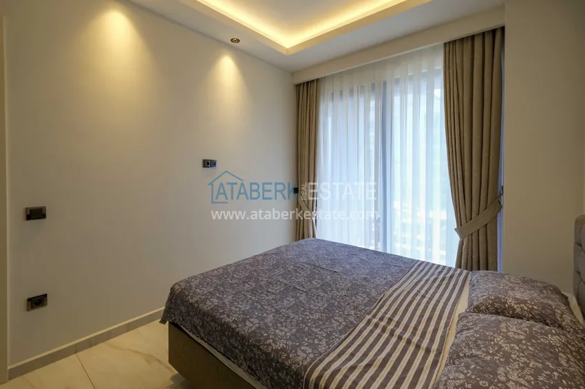 Kupuj Apartament 1+1 przy plaży w Mahmutlar — umeblowany i z panoramicznym widokiem na morze 8 