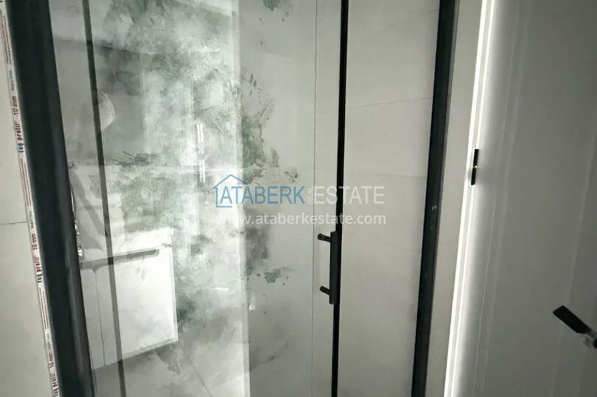 Purchase 1+1 apartment with mountain views in Mahmutlar - resort-format complex 13
