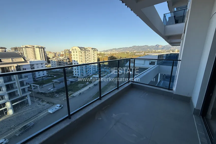 Purchase 1+1 apartment with mountain views in Mahmutlar - resort-format complex 15