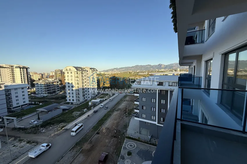 Purchase 1+1 apartment with mountain views in Mahmutlar - resort-format complex 17