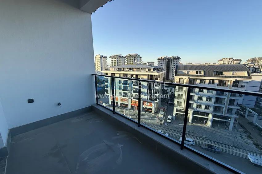 Purchase 1+1 apartment with mountain views in Mahmutlar - resort-format complex 18