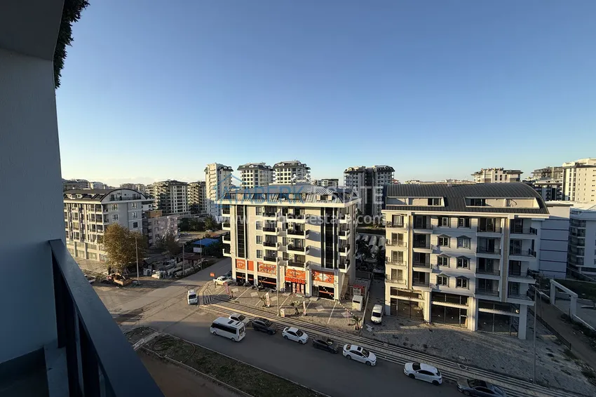 Purchase 1+1 apartment with mountain views in Mahmutlar - resort-format complex 19