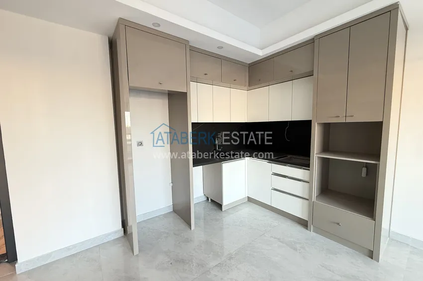 Purchase 1+1 apartment with mountain views in Mahmutlar - resort-format complex 4