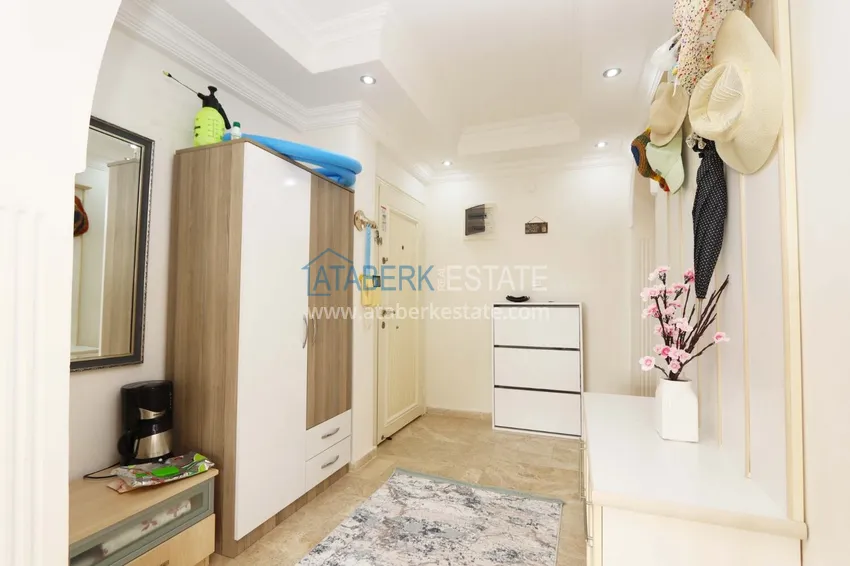 Purchase 2+1 apartment with furniture and access to the garden in the Avsallar area 1