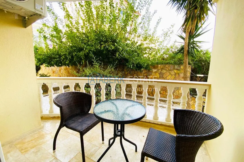 Purchase 2+1 apartment with furniture and access to the garden in the Avsallar area 27