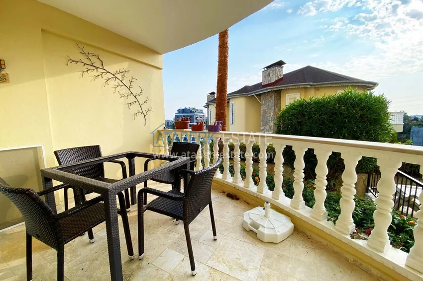 Purchase 2+1 apartment with furniture and access to the garden in the Avsallar area 30