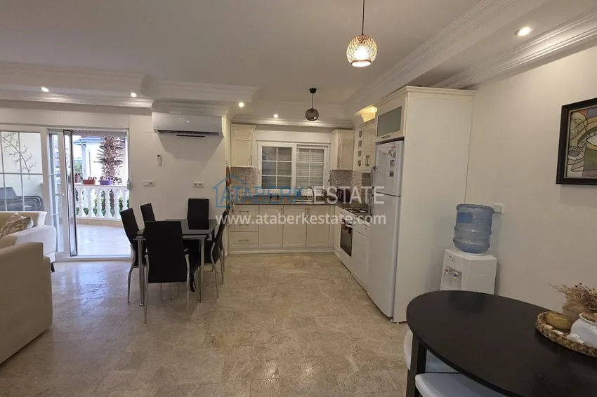Purchase 2+1 apartment with furniture and access to the garden in the Avsallar area 5