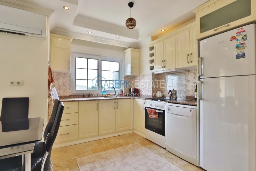 Purchase 2+1 apartment with furniture and access to the garden in the Avsallar area 8
