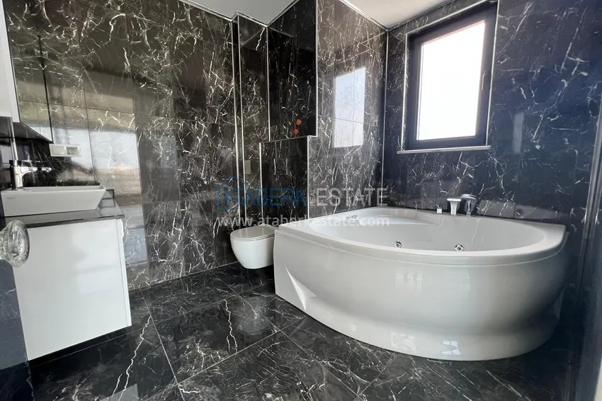 Purchase Penthouse duplex 3+2 with open sea views in Mahmutlar. Citizenship Real Estate 9