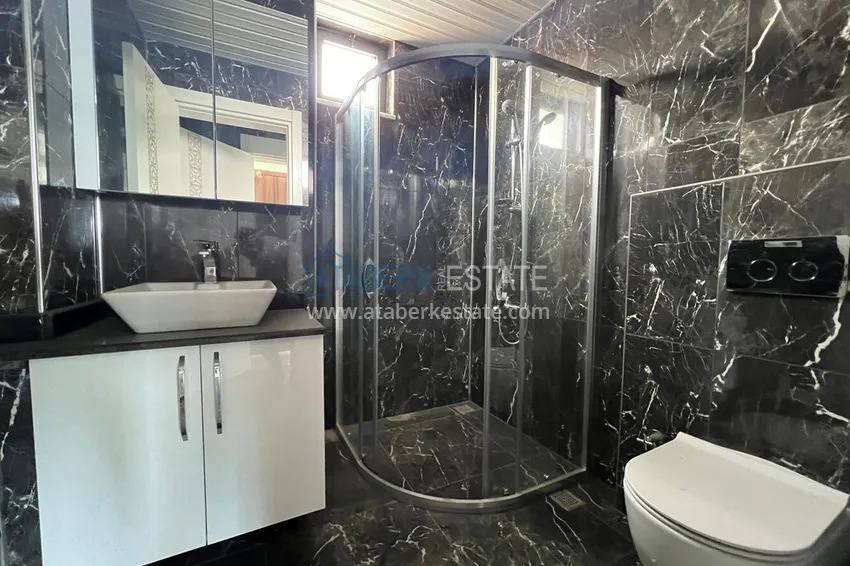 Purchase Penthouse duplex 3+2 with open sea views in Mahmutlar. Citizenship Real Estate 11
