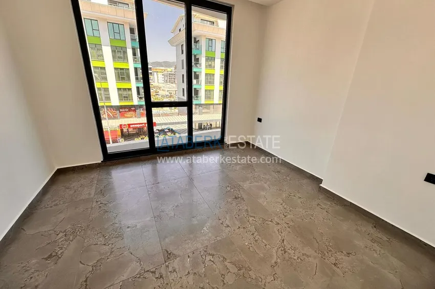 Purchase  2+1 apartment with sea view in Kargicak on the beachfront  10 