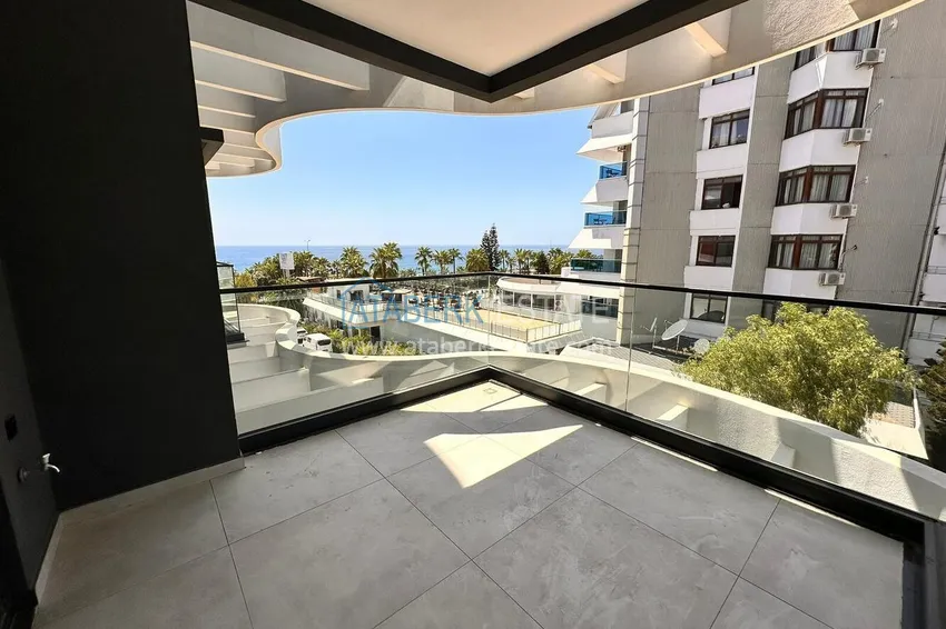 Purchase  2+1 apartment with sea view in Kargicak on the beachfront  17 