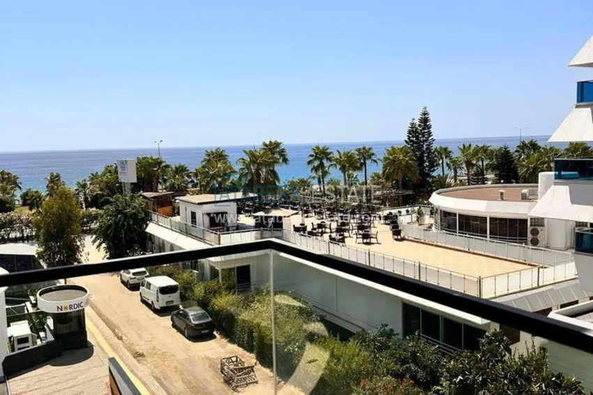 Purchase  2+1 apartment with sea view in Kargicak on the beachfront  18 