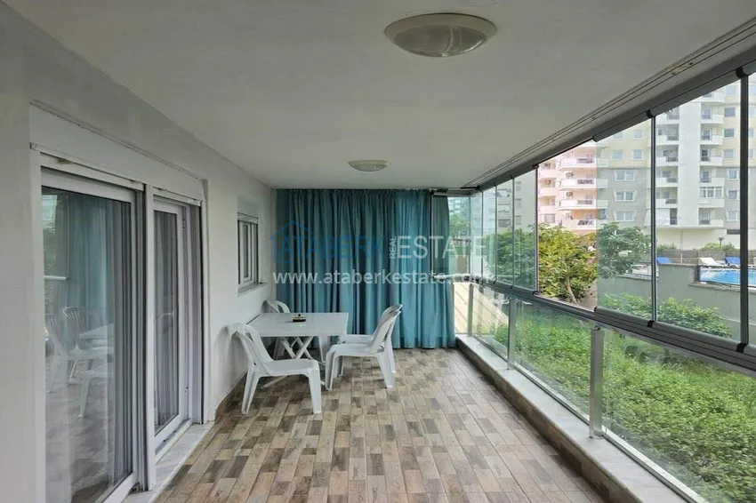 Purchase 65 m2 two-room apartment in Mahmutlar — furnished and with a glazed balcony 11