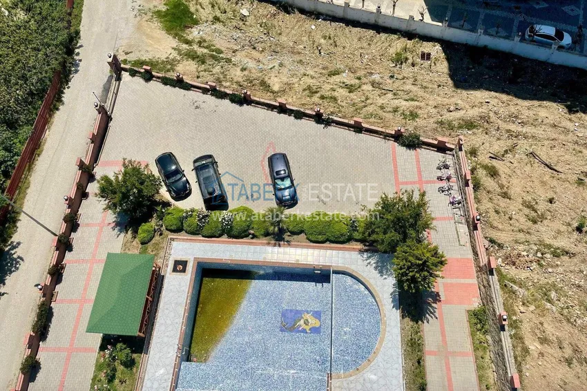 Purchase 2+1 apartment in the center of Mahmutlar — south side, new furniture, separate kitchen 17 