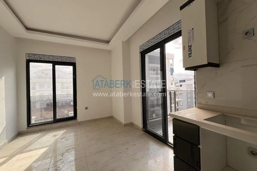Приобрести Квартира 1+1 57 м² с видом на море в Махмутларе - современный жилой комплекс 5