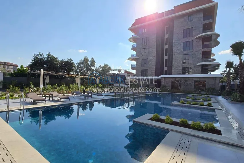 1+1 apartment overlooking the sea and the fortress on the beachfront in Kestel 18 