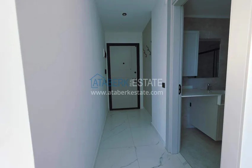 Purchase 1+1 apartment overlooking the sea and the fortress on the beachfront in Kestel 2 