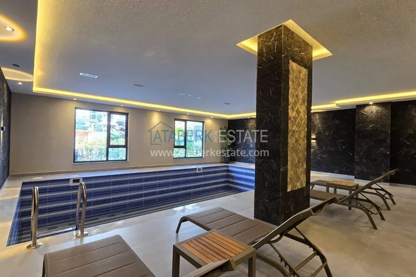 1+1 apartment overlooking the sea and the fortress on the beachfront in Kestel 38 