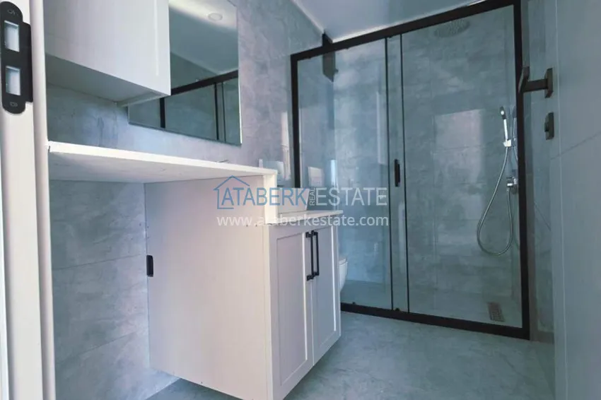 Purchase 1+1 apartment overlooking the sea and the fortress on the beachfront in Kestel 3 