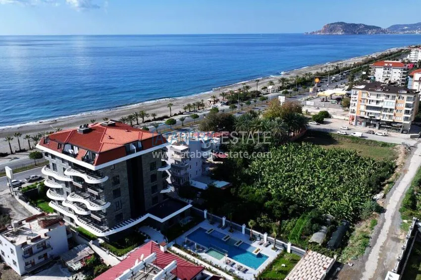 1+1 apartment overlooking the sea and the fortress on the beachfront in Kestel 1 