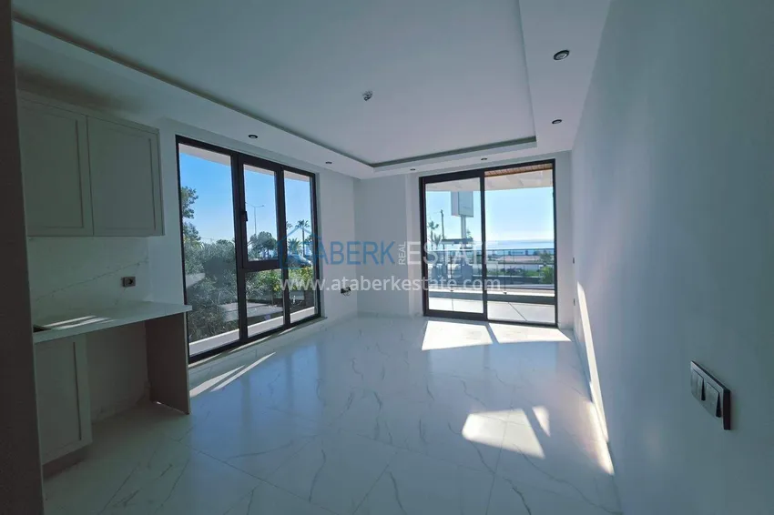 Purchase 1+1 apartment overlooking the sea and the fortress on the beachfront in Kestel 4 