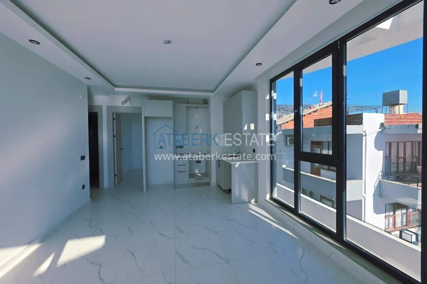 Purchase 1+1 apartment overlooking the sea and the fortress on the beachfront in Kestel 5 